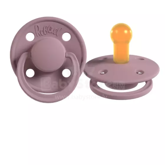 Rebael Natural Rubber Round Latex Art.292022 Plum  mannekeen (lutt), mis on valmistatud 100% looduslikust kummist vanuses 0-6 kuud. (1 tk.)