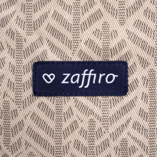 WOMAR Vidzĩtsɔʋu Zaffiro City Air Beige Aŋgbawo